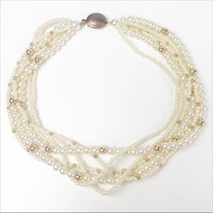 Multi strand faux gold and pearl necklace